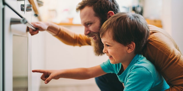 Father and son in the kitchen. When was the last time you made a new mac and cheese dish for the whole family? The recipe shared here might just become a favorite to keep cooking again and again. 