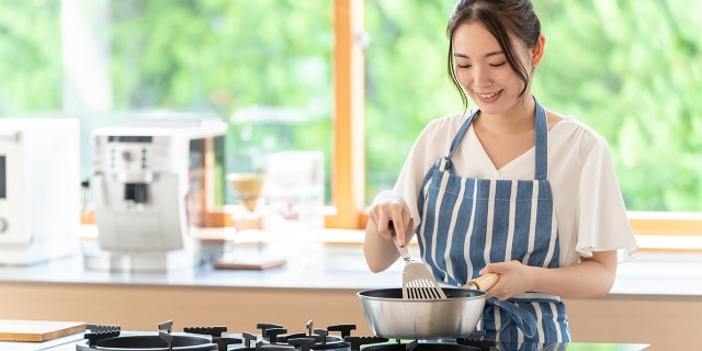 cooking in kitchen