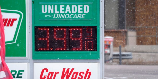 Price for a gallon of regular-grade gasoline is shown on a digital sign at a service station Wednesday, March 9, 2022, in Denver.