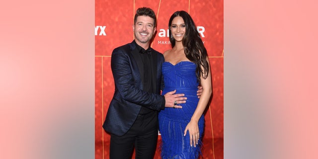 Thicke and Geary became engaged in December 2018. They have three children together – Mia, 4; Lola, 3; and Luca, 1.