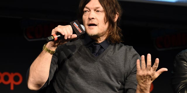 Norman Reedus speaks onstage during The Walking Dead Universe at New York Comic Con 2019 at Hulu Theater at Madison Square Garden Oct. 5, 2019, in New York City.