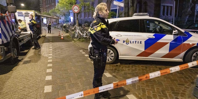 Police investigate the scene of a spate of stabbings in Amsterdam on May 22, 2021 in which one person died and four were injured. - A 29-year-old man was arrested at the scene after the attacks happened late on May 21, 2021 in an area of bars and restaurants near the capital's museum quarter. Police said there were no indications of terrorism. - Netherlands OUT (MICHEL VAN BERGEN/ANP/AFP via Getty Images)
