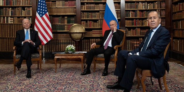 US President Joe Biden (L), Russian President Vladimir Putin (C) and Russian Foreign Minister Sergei Lavrov (R) pose for press prior to the US-Russia summit at the Villa La Grange, in Geneva on June 16, 2021.