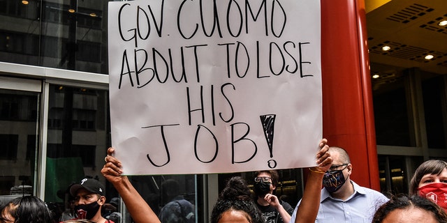 NEW YORK, NY - AUGUST 04: People participate in a protest against N.Y. Governor Andrew Cuomo and protest for a moratorium on evictions on August 4, 2021 in New York City.