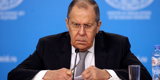 Russian Foreign Minister Sergei Lavrov looks on as he gives an annual press conference on Russian diplomacy in 2021, in Moscow on Jan. 14, 2022.