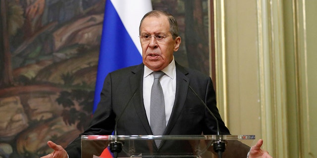 Russian Foreign Minister Sergei Lavrov gestures during a press conference following talks with his Italian counterpart in Moscow, on February 17, 2022. 