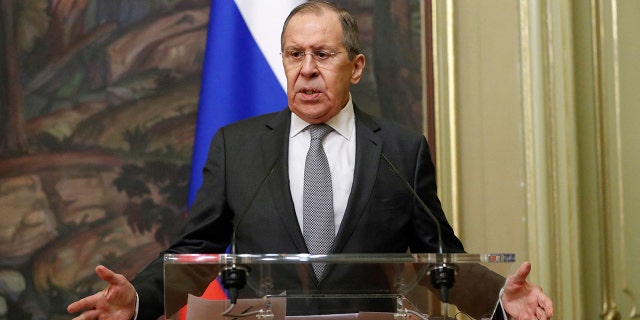 Russian Foreign Minister Sergei Lavrov gestures during a press conference following talks with his Italian counterpart in Moscow, on February 17, 2022.