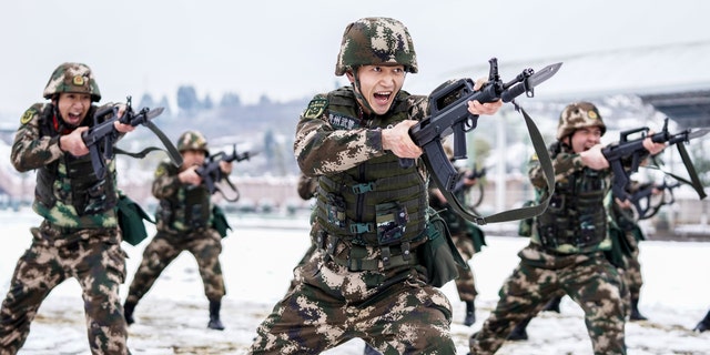 Officers and soldiers conduct training in Southwest Guizhou, Guizhou Province, China, Feb. 22, 2022. (Costfoto/Future Publishing via Getty Images)