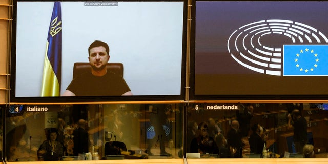 Former CIA station chief on Putin-linked mercenaries hunting Zelensky in Ukraine 2 Ukraine's President Volodymyr Zelensky is seen on a screen as he delivers a speech to the Assembly of the European Parliament on March 1, 2022