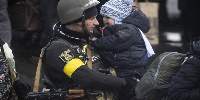 IRPIN, UKRAINE - MARCH 08: Civilians continue to flee from Irpin due to ongoing Russian attacks in Irpin, Ukraine on March 08, 2022.