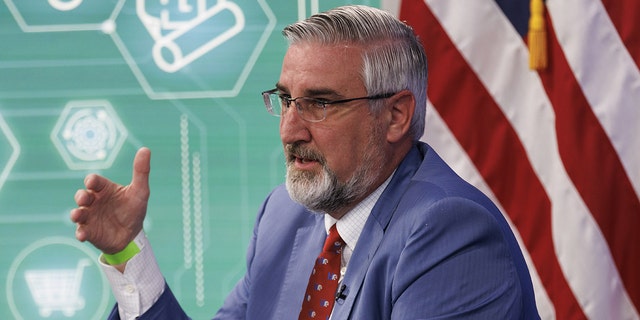 Eric Holcomb, governor of Indiana, speaks during a meeting with U.S. President Joe Biden, business leaders and governors on Wednesday, March 9, 2022.