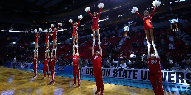 The Indiana Hoosiers cheerleaders perform against the Saint Mary's Gaels during the first round of the 2022 NCAA Men's Basketball Tournament held at the Moda Center on March 17, 2022 in Portland, Oregon.