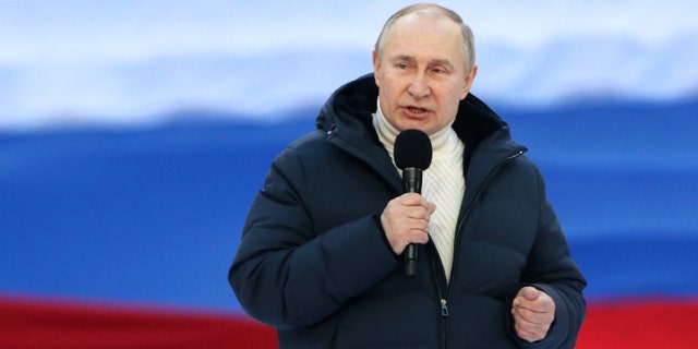 Russian President Vladimir Putin speeches during the concert marking the anniversary of the annexation of Crimea, March,18,2022, in Moscow, Russia. Thousands people gathered at Luznkiki Stadium to support President Putin, annexation of Crimea and military invasion on Ukraine. (Photo by Contributor/Getty Images)