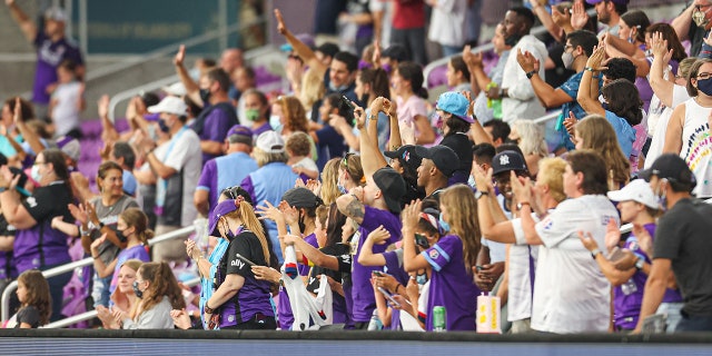 Fans celebrate the Orlando Pride win after the home game at Exploria Stadium against Kansas City on May 30, 2021, in Orlando, Florida.