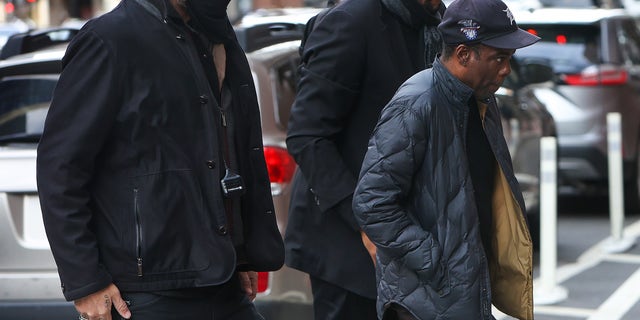 Chris Rock seen for the first time since the Oscars incident with Will Smith Sunday evening. Rock enters the Wilbur Theater in Boston for the first of his two sold-out performances March 30, 2022.