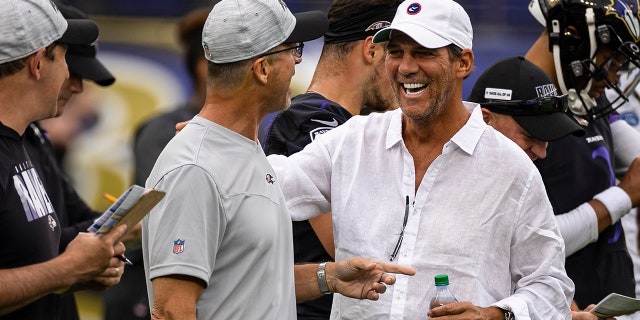 Ravens' Lamar Jackson says he loves team, rips ‘false narrative’ about him leaving Baltimore 3 Head coach John Harbaugh of the Baltimore Ravens laughs with owner Steve Bisciotti during training camp at M&T Bank Stadium on July 31, 2021 in Baltimore, Maryland.