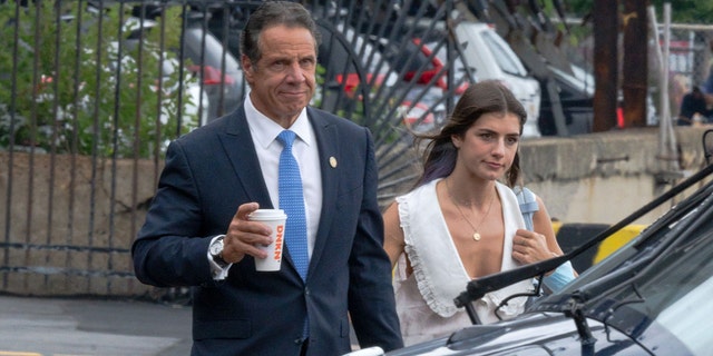 New York Governor Andrew Cuomo (L) and Michaela Kennedy-Cuomo are seen at the Eastside Heliport in Midtown on August 10, 2021 in New York City.
