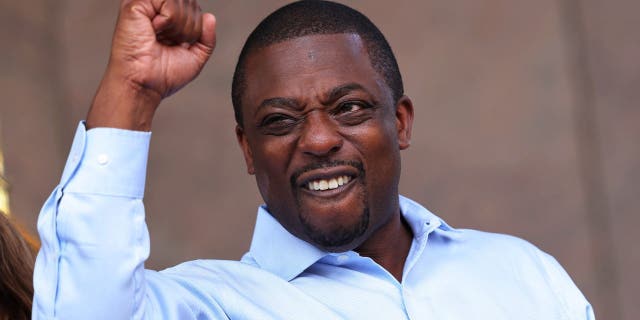 State Senator Brian Benjamin pumps his fist as he celebrates during a press conference announcing him as Lt. Governor on August 26, 2021, in New York City.