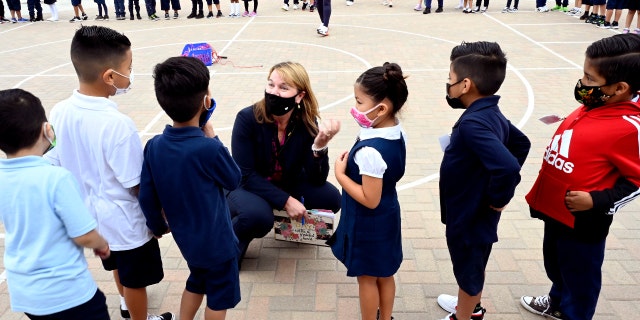 Long Beach Unified School District Superintendent Jill Baker talks to first-graders at Roosevelt Elementary School in Long Beach on Aug. 31, 2021. (Brittany Murray/MediaNews Group/Long Beach Press-Telegram via Getty Images)