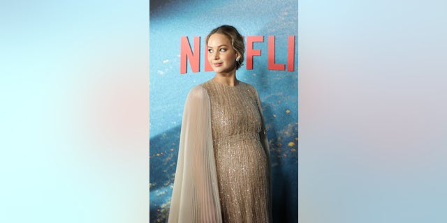 Amy Schumer, one of the Oscars host's this year, poked fun at close pal Jennifer Lawrence's weight gain in "Dont Look Up." Lawrence, who gave birth to her first child this Febuary, was pregnant during filming.