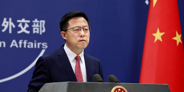BEIJING, CHINA - DECEMBER 20: Chinese Foreign Ministry spokesman Zhao Lijian attends a news conference on December 20, 2021 in Beijing, China. 