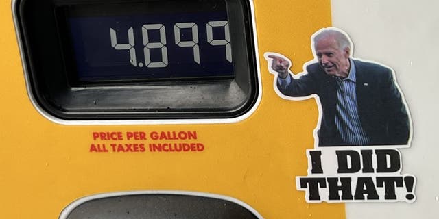 A satirical protest sticker critical of American President Joe Biden, with text reading I Did That, has been placed on a gasoline pump in Lafayette, California.