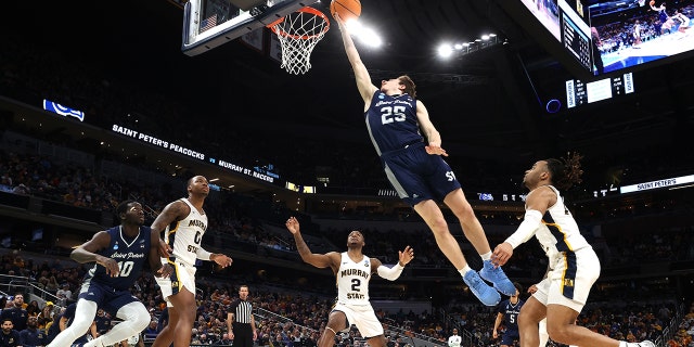 Doug Edert #25 of the St. Peter's Peacocks shoots against the Murray State Racers in the second half during the second round of the 2022 NCAA Men's Basketball Tournament at Gainbridge Fieldhouse on March 19, 2022 in Indianapolis, Indiana.