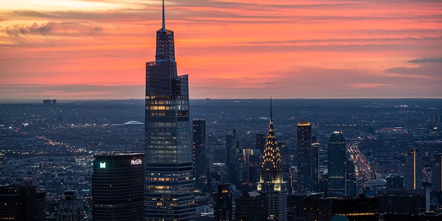 NEW YORK, NEW YORK - MARCH 20: A view of One Vanderbilt during a sunrise as seen from the Edge observation deck at Hudson Yards on the first day of spring on March 20, 2022 in New York City.