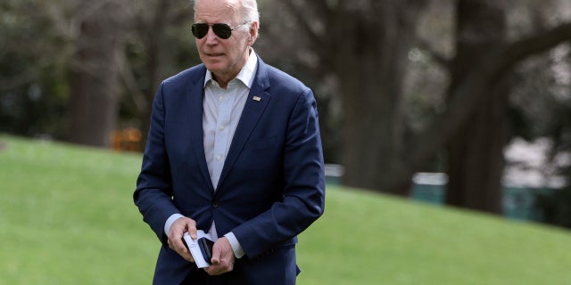 President Biden returns to the White House on March 20, 2022, in Washington. (Kevin Dietsch/Getty Images)