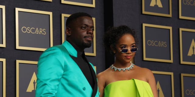 Presenters Daniel Kaluuya and H.E.R. pose in the press room during the 94th Annual Academy Awards at Hollywood and Highland on March 27, 2022 in Hollywood, California.