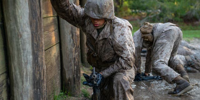 Marine Corps recruits are run through a simulated resupply exercise. (Photo by Robert Nickelsberg/Getty Images)