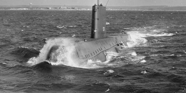 The world's first nuclear-powered submarine Nautilus sets out to sea on a trial run.