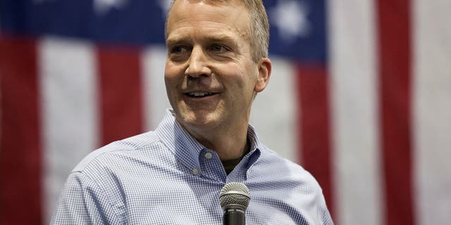 Sen. Dan Sullivan, R-Alaska, addresses the crowd during a campaign rally at a PenAir airplane hangar on Nov. 3, 2014, in Anchorage, Alaska.