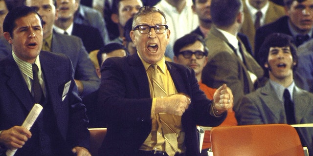 UCLA coach John Wooden on the sidelines yelling alongside assistant Denny Crum during a game against Jacksonville in College Park, Md. March 21, 1970.