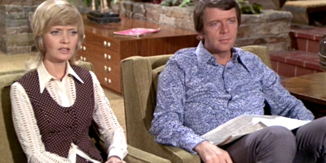 Florence Henderson as Carol Brady and Robert Reed as Mike Brady.