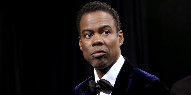In this handout photo provided by A.M.P.A.S.,  Chris Rock is seen backstage during the 94th Annual Academy Awards at Dolby Theatre on March 27, 2022 en hollywood, California.)