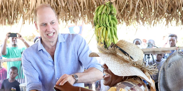 Prince William, Duke of Cambridge dances during a traditional Garifuna festival on the second day of a Platinum Jubilee Royal Tour of the Caribbean on March 20, 2022, in Hopkins, Belize.