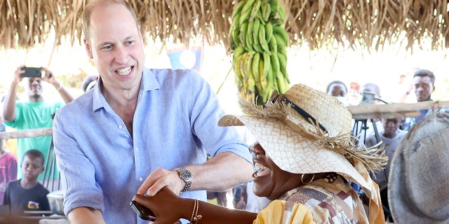 Prince William, Duke of Cambridge dances during a traditional Garifuna festival on the second day of a Platinum Jubilee Royal Tour of the Caribbean on March 20, 2022, in Hopkins, Belize.