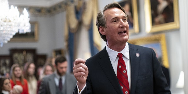 Glenn Youngkin, governor of Virginia, speaks to members of the media following a cabinet swearing-in ceremony at the Virginia Executive Mansion, in Richmond, Virginia, U.S., on Saturday, Jan. 15, 2022. 