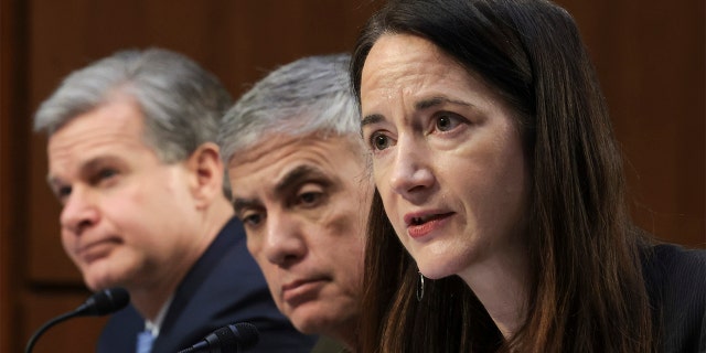 FBI Director Christopher Wray, left, National Security Agency Director Gen. Paul Nakasone and Director of National Intelligence Avril Haines testify before the Senate Intelligence Committee on March 10, 2022, in Washington.