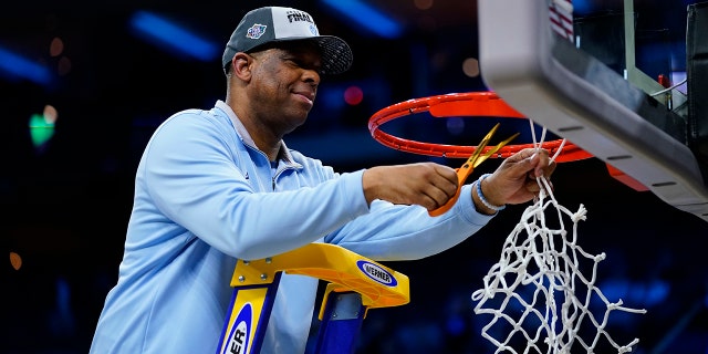 North Carolina's Hubert Davis celebrates after North Carolina defeated St. Peter's in Elite Round 8 of the NCAA Tournament, Sunday, March 27, 2022, in Philadelphia.