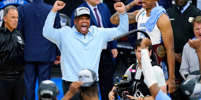 North Carolina head coach Hubert Davis celebrates after North Carolina's victory over Saint. Peter is in the Elite 8 round of the NCAA Tournament, Sunday, March 27, 2022, in Philadelphia.
