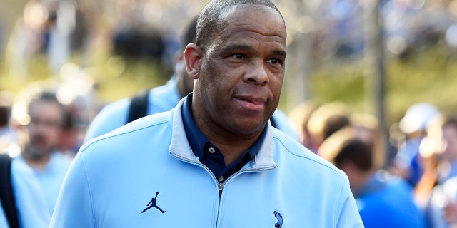North Carolina Tar Heels head coach Hubert Davis approaches Cameron Indoor Stadium before a game against the Duke Blue Devils on March 5, 2022.