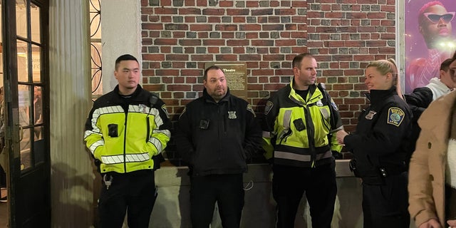 Boston Police officers standby during Chris Rock's show in Boston, Massachusetts.