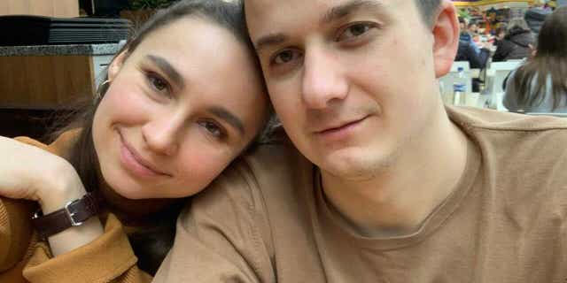 Ukrainian hacker Petro Tsymbalistyi and his wife Mariia prior to Russia's invasion of Ukraine.