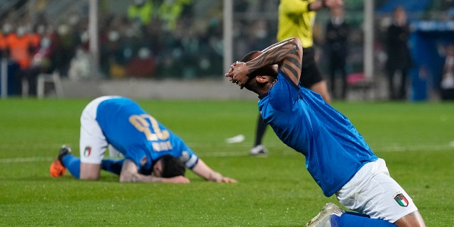 Italy's Joao Pedro reacts after missing a scoring chance in the World Cup qualifying play-offsoccer match between Italy and North Macedonia, at Renzo Barbera stadium, in Palermo, Italy, Thursday, March 24, 2022. North Macedonia won 1-0.