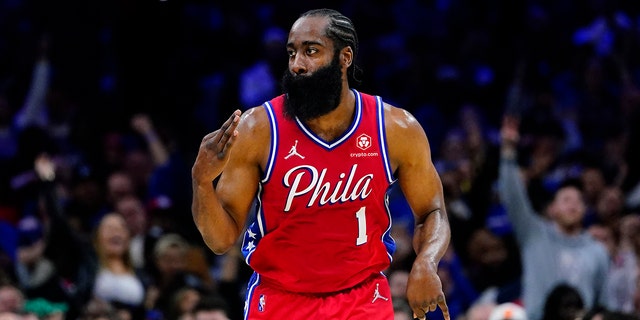 Philadelphia 76ers' James Harden reacts after a basket during the first half of an NBA basketball game against the New York Knicks, Wednesday, March 2, 2022, in Philadelphia.