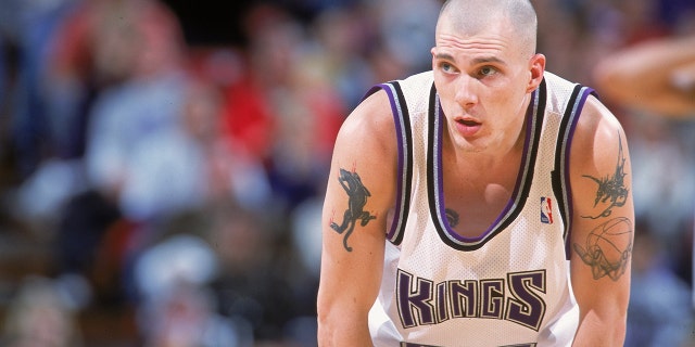 Jason Williams of the Sacramento Kings waits on the court during the game against the San Antonio Spurs at the ARCO Arena in Sacramento, California. The Spurs defeated the Kings 97-91.