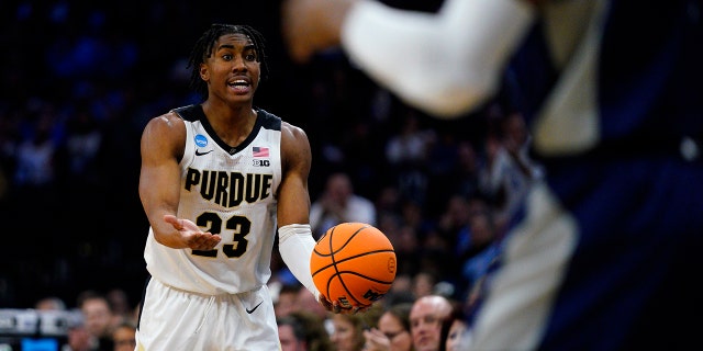 Purdue's Jaden Ivey reacts during the first half of a college basketball game against Saint Peter's in the Sweet 16 round of the NCAA tournament, Friday, March 25, 2022, in Philadelphia. (WHD Photo/Chris Szagola)