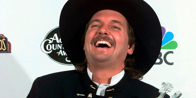 Jeff Carson poses backstage at the 31st Annual Academy of Country Music Awards, April 24, 1996 in Universal City, California. The country music singer and songwriter Jeff Carson, who scored hits with "Not On Your Love," and "The Car" before becoming a police officer, has died in Tennessee, his publicist said.
